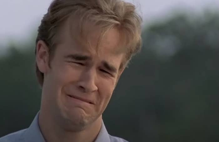 James Van Der Beek crying with a pained expression in a scene from "Dawson's Creek."