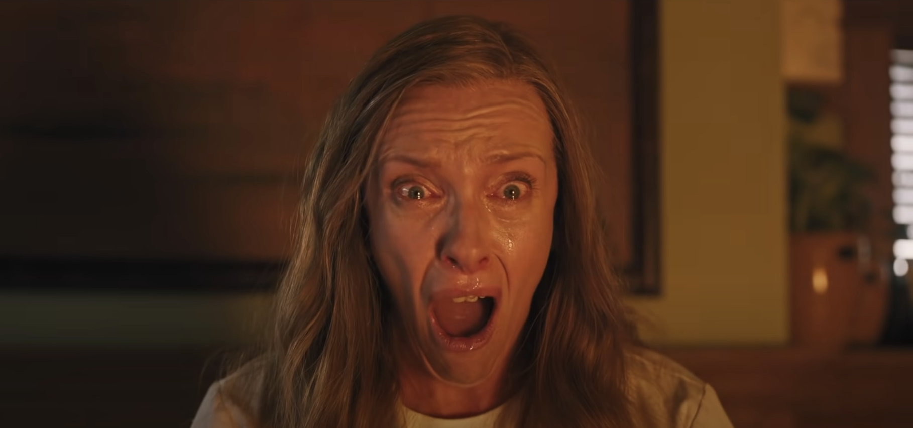 Toni Collette&#x27;s character screams in horror in a scene from the movie &quot;Hereditary.&quot;