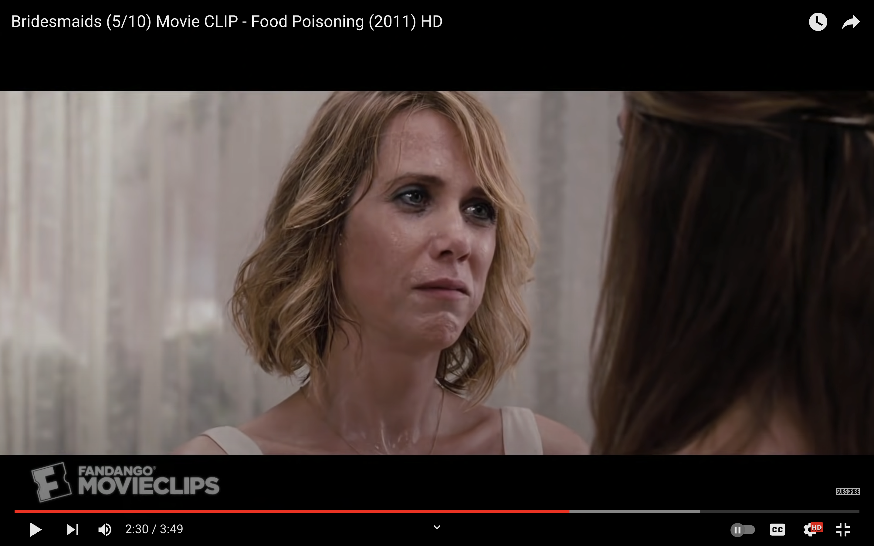 Kristen Wiig appears sweaty and nauseous in a scene from "Bridesmaids"