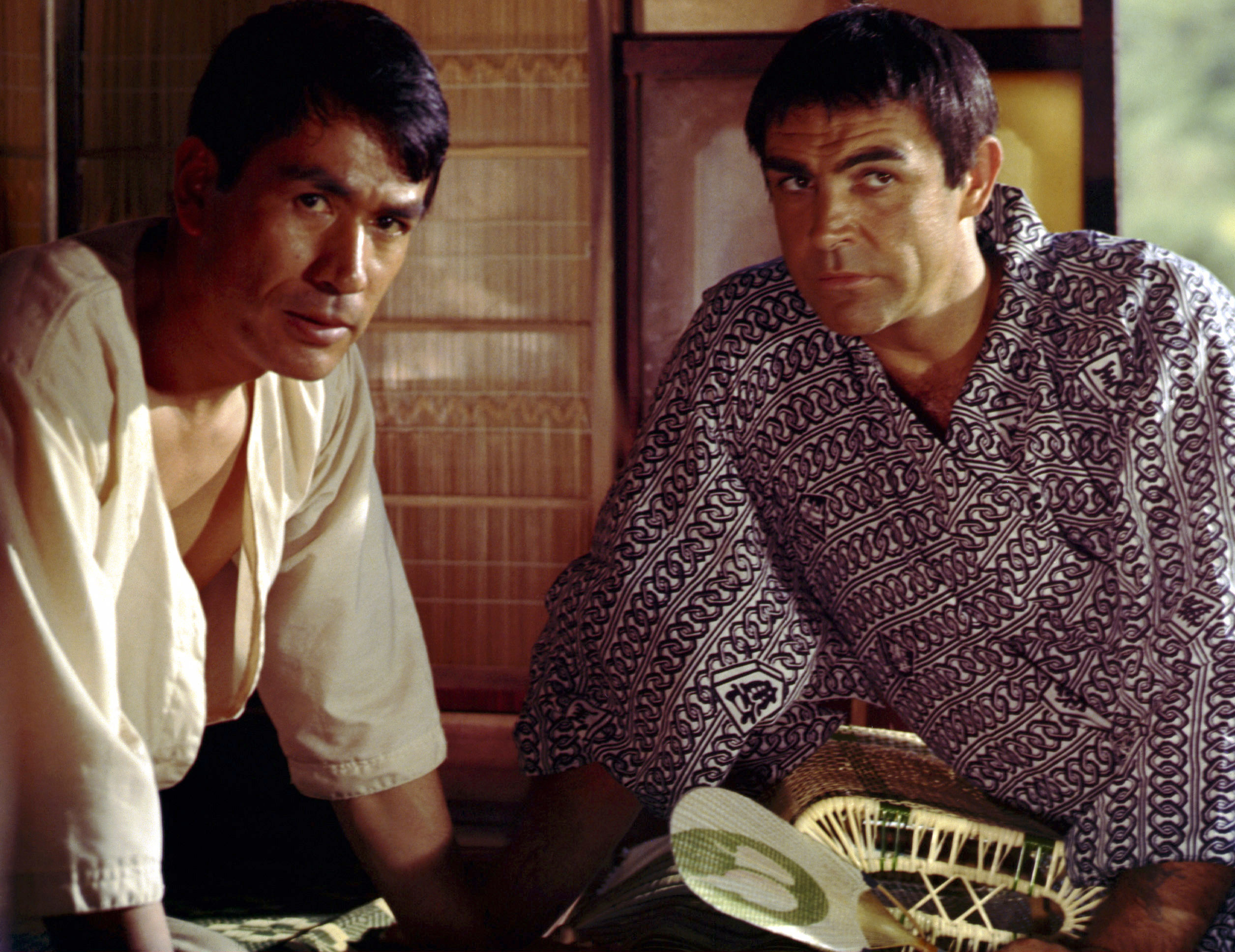 Toshiro Mifune and Sean Connery in traditional Japanese attire, sitting indoors