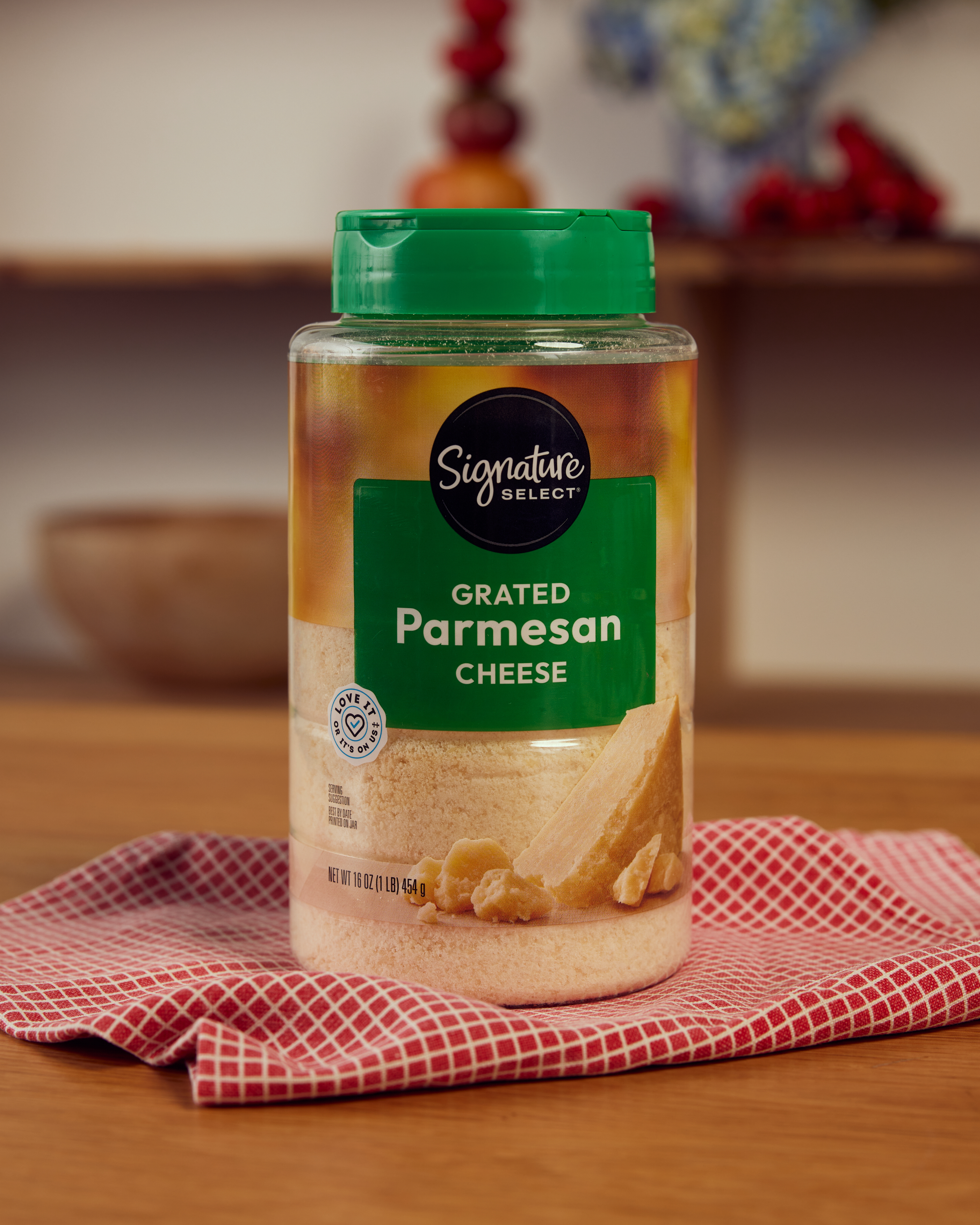 Container of Signature Select Grated Parmesan Cheese