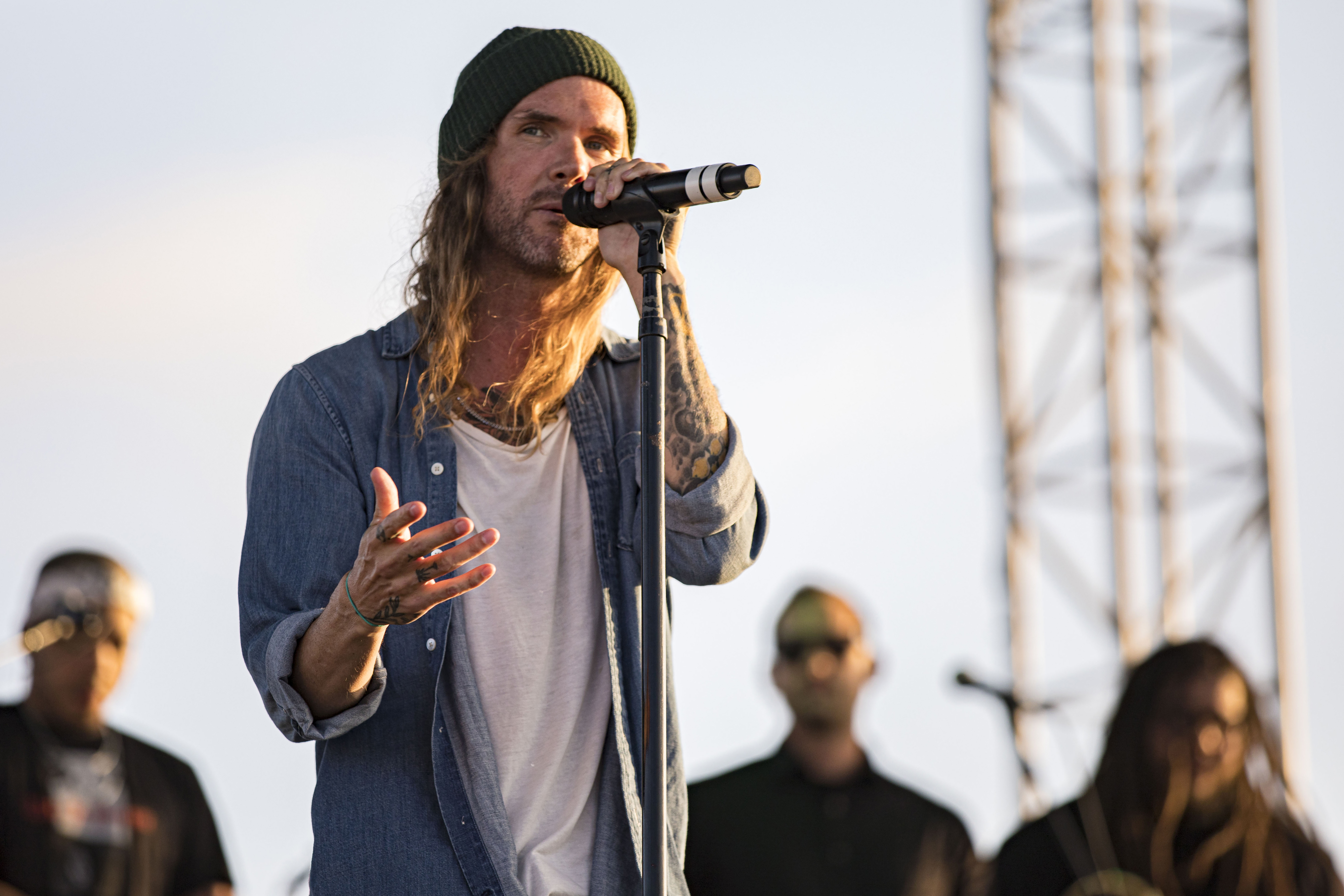 Dirty Heads lead singer performs on stage