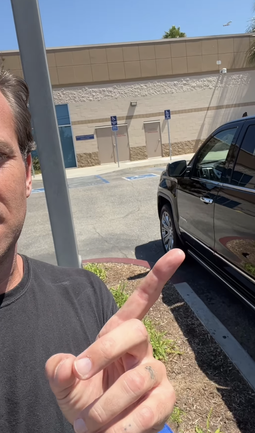 Armie points at his truck