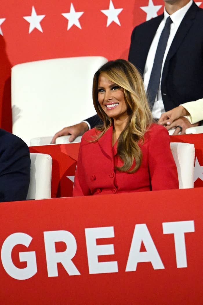 Melania Trump smiling and seated