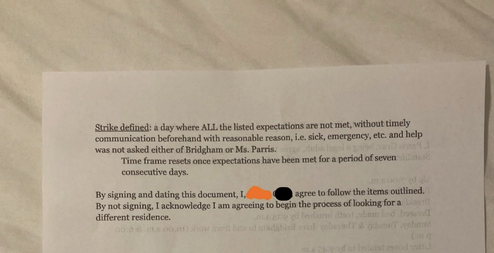 A document defines a strike and its conditions. By signing, the individual acknowledges beginning the process of looking for different housing if not followed