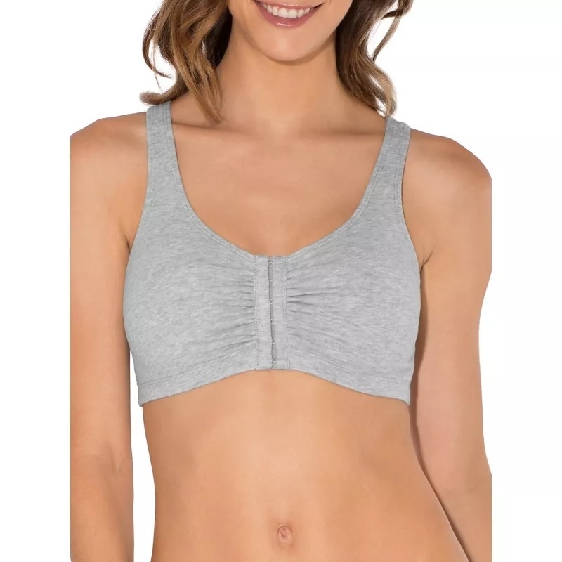 A woman, not identified by name, is wearing a sleeveless, heather grey bralette with a front ruched detail. The focus is on the bralette for a shopping article