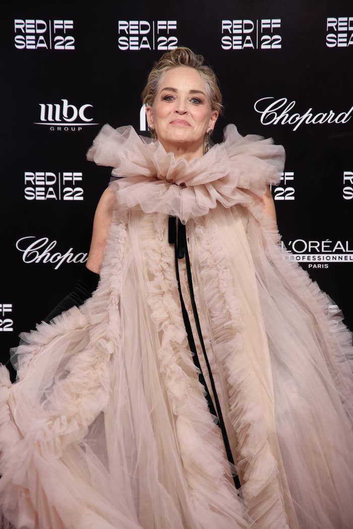 Sharon Stone on the red carpet at Red Sea FF 22, wearing an elaborate, ruffled gown