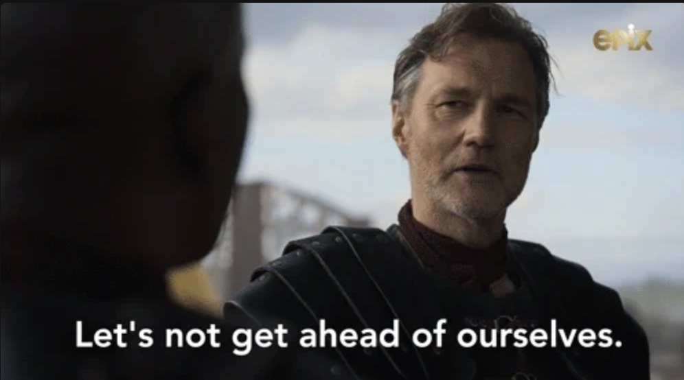 David Morrissey in a dramatic scene, wearing armor, saying, "Let's not get ahead of ourselves."