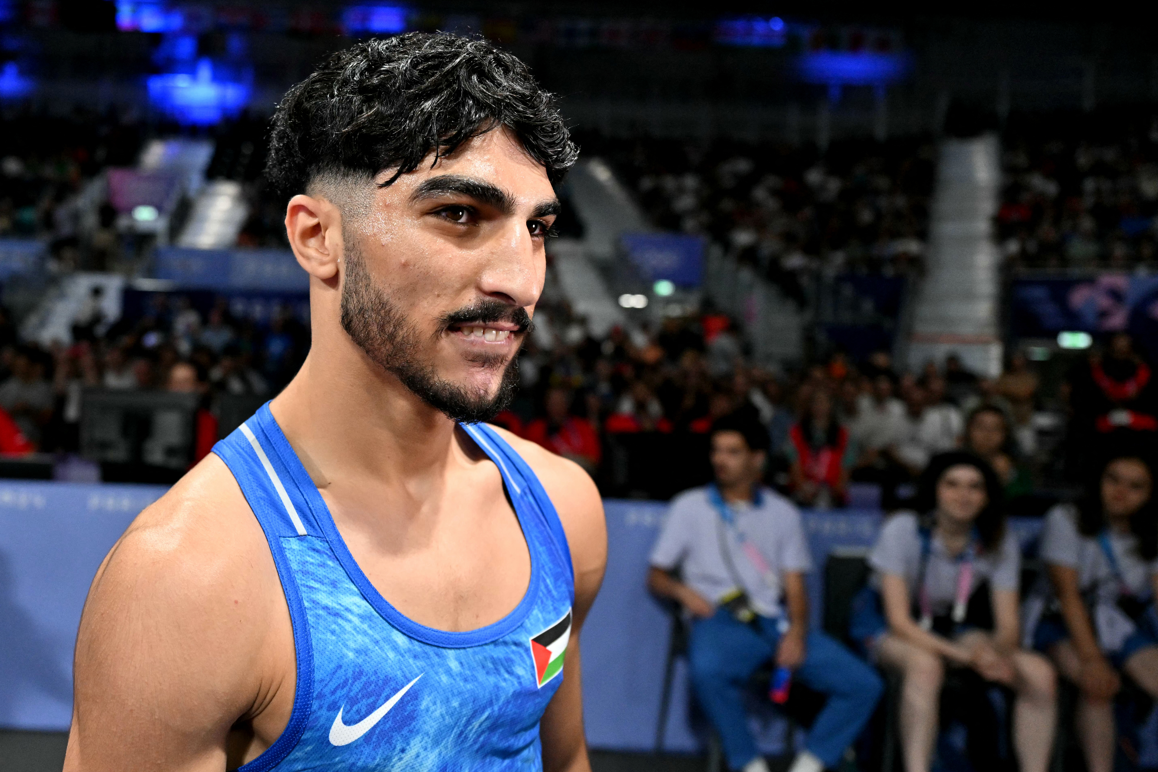 Waseem Abu Sal shows solidarity to the Palestinian cause at the Olympics.