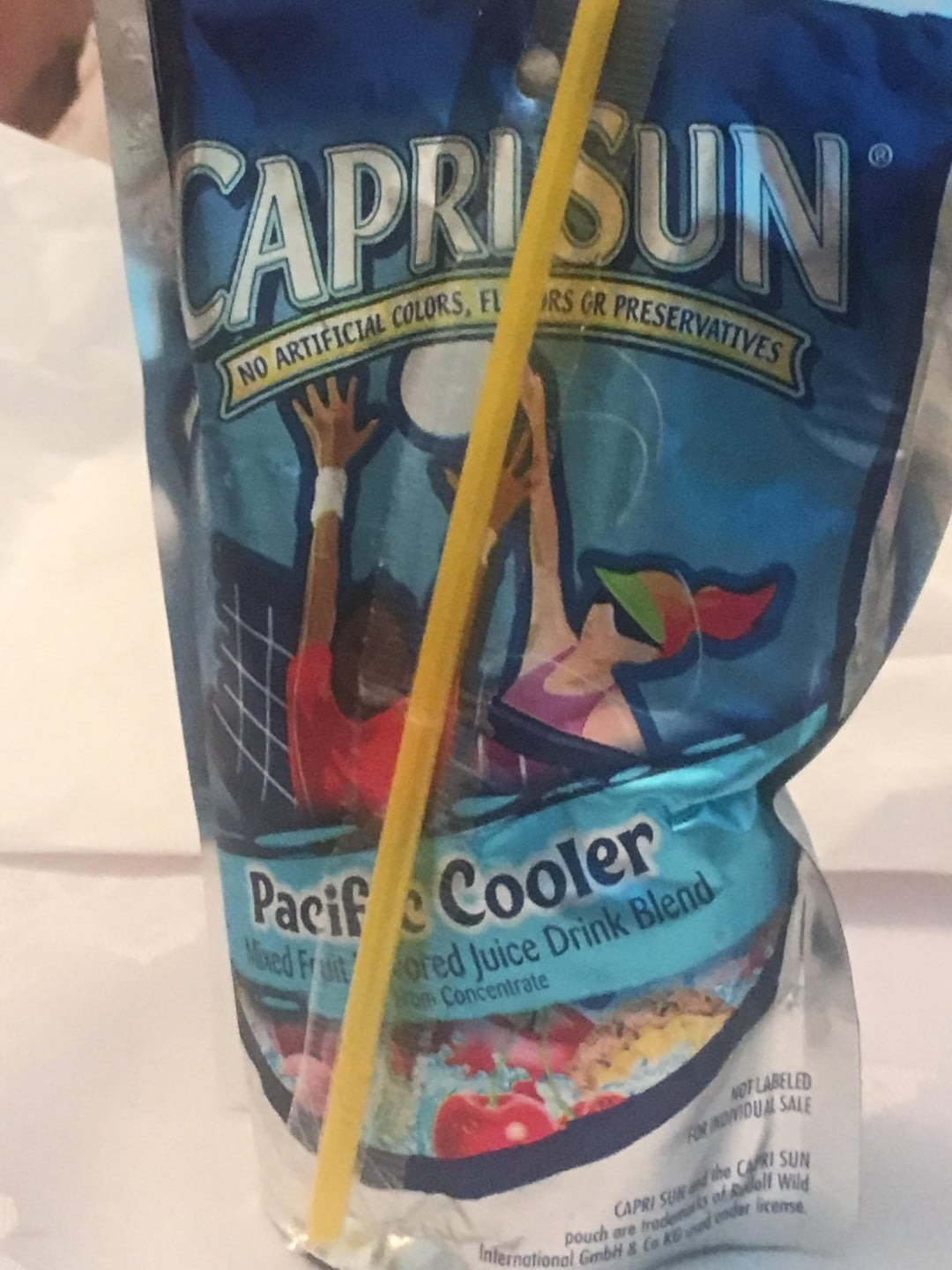 Capri Sun Pacific Cooler mixed fruit juice drink pouch with a yellow straw