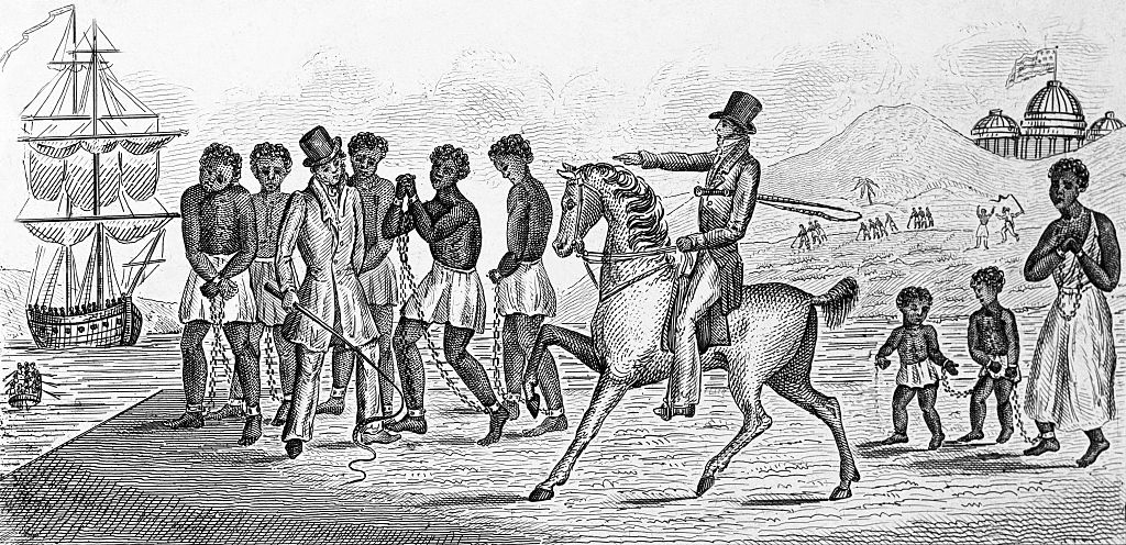 A historical illustration depicts enslaved individuals bound in chains on land next to a ship, with an overseer on horseback holding a whip