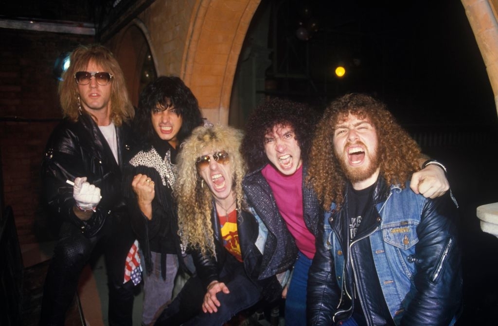 Twisted Sister posing animatedly and looking excited