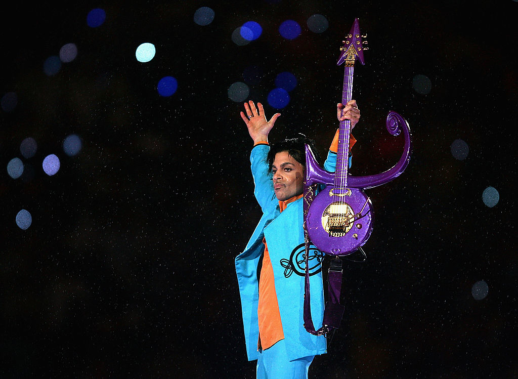 Prince performs on stage