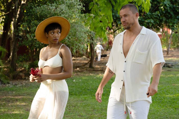 Naomi Ackie and Channing Tatum walking outdoors in neutral outfits in &quot;Blink Twice&quot;