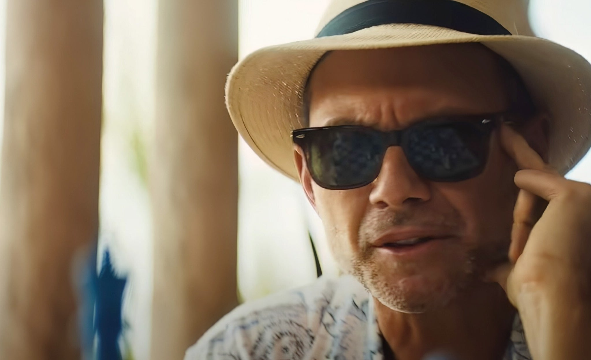 Christian Slater wearing a fedora hat and sunglasses in &quot;Blink Twice&quot;
