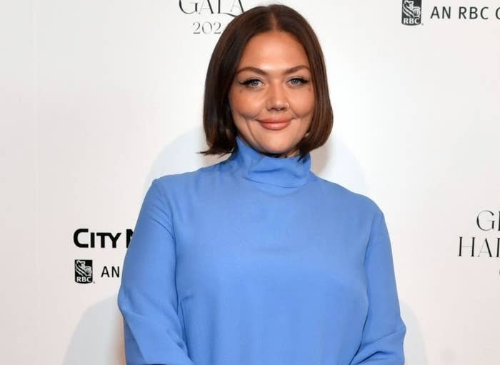 Elle King attends the Grammy Hall of Fame Gala 2023, wearing a blue long-sleeve dress with fringe details