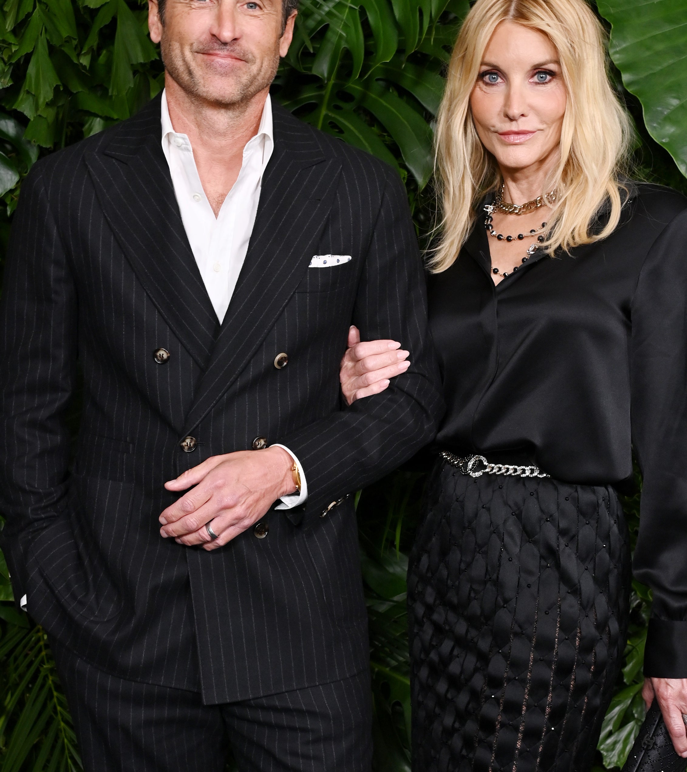 Patrick Dempsey and Jillian Fink attend the CHANEL and Charles Finch Annual Pre-Oscar Dinner