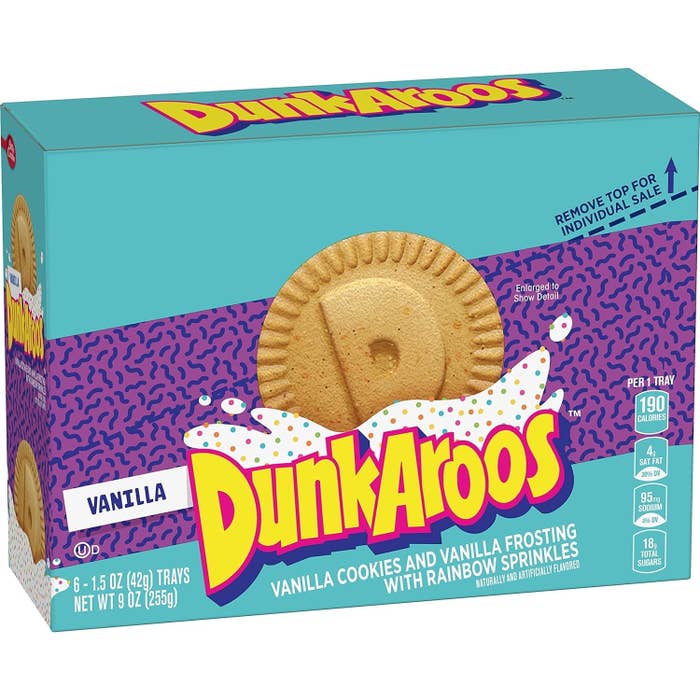 Box of DunkAroos vanilla cookies with vanilla frosting and rainbow sprinkles, showing 190 calories per serving and 6 individual packs inside