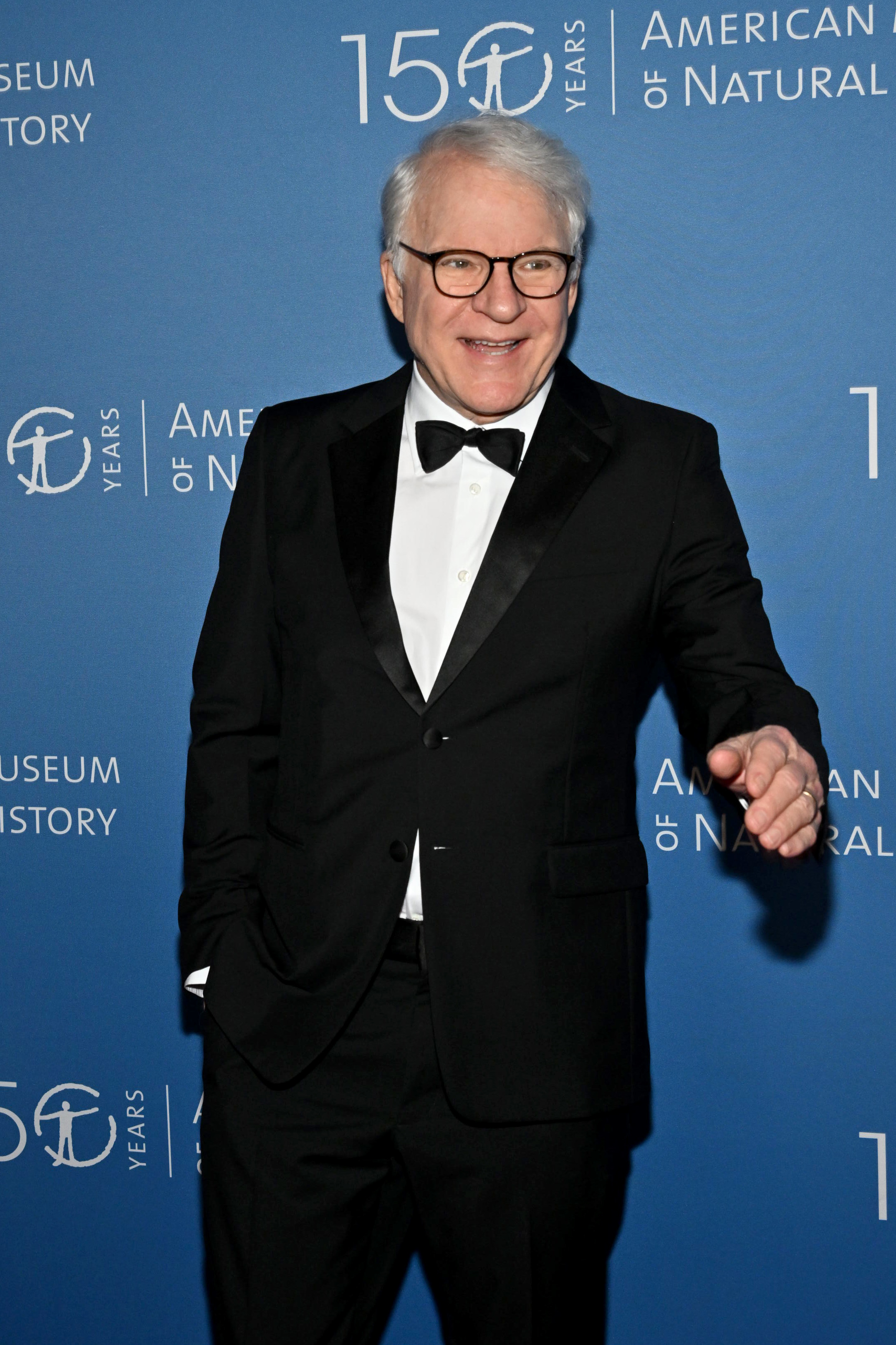 Steve Martin in a black tuxedo and bow tie at the American Museum of Natural History's 150th Anniversary event