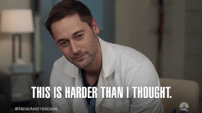 Ryan Eggold as Dr. Max Goodwin in New Amsterdam leans forward in a contemplative pose with the text overlay "THIS IS HARDER THAN I THOUGHT."
