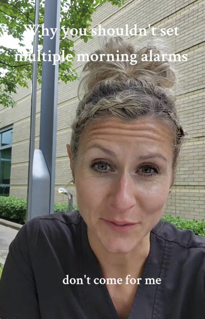 A woman with blonde hair in a bun is speaking outside in front of a building. Text reads, &quot;Why you shouldn't set multiple morning alarms&quot; and &quot;don't come for me.&quot;