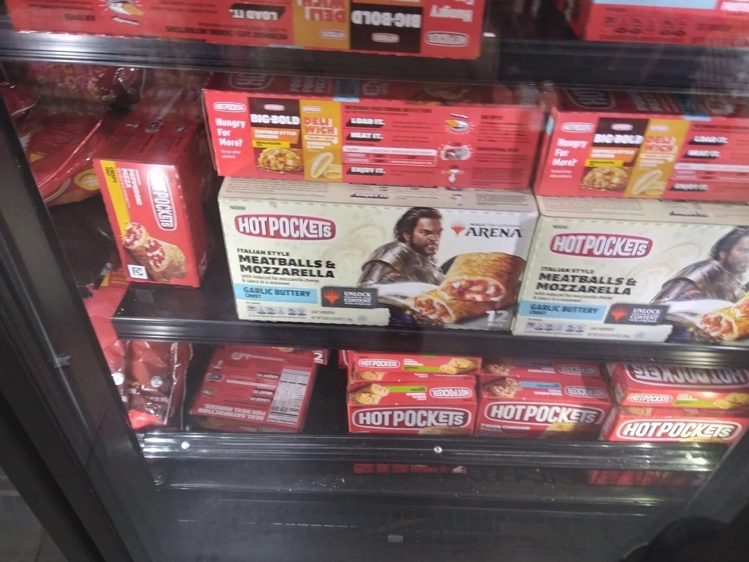 Frozen meal section in a grocery store featuring Hot Pockets, including Meatballs &amp;amp; Mozzarella with a garlic buttery crust, displayed prominently in the refrigerator