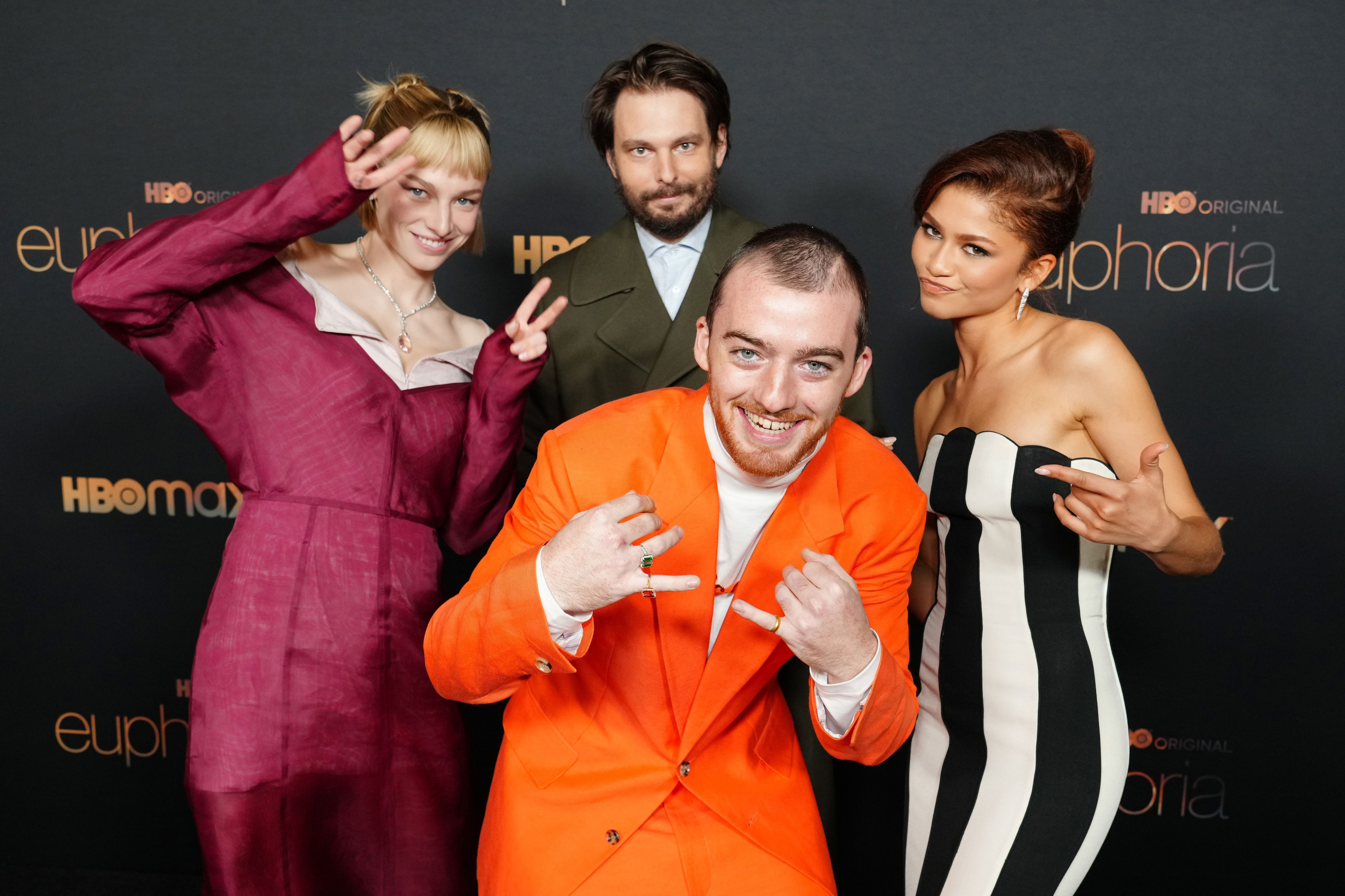 Hunter Schafer, Sam, Zendaya, and Angus Cloud pose playfully on the red carpet at the HBO Max's "Euphoria" premiere