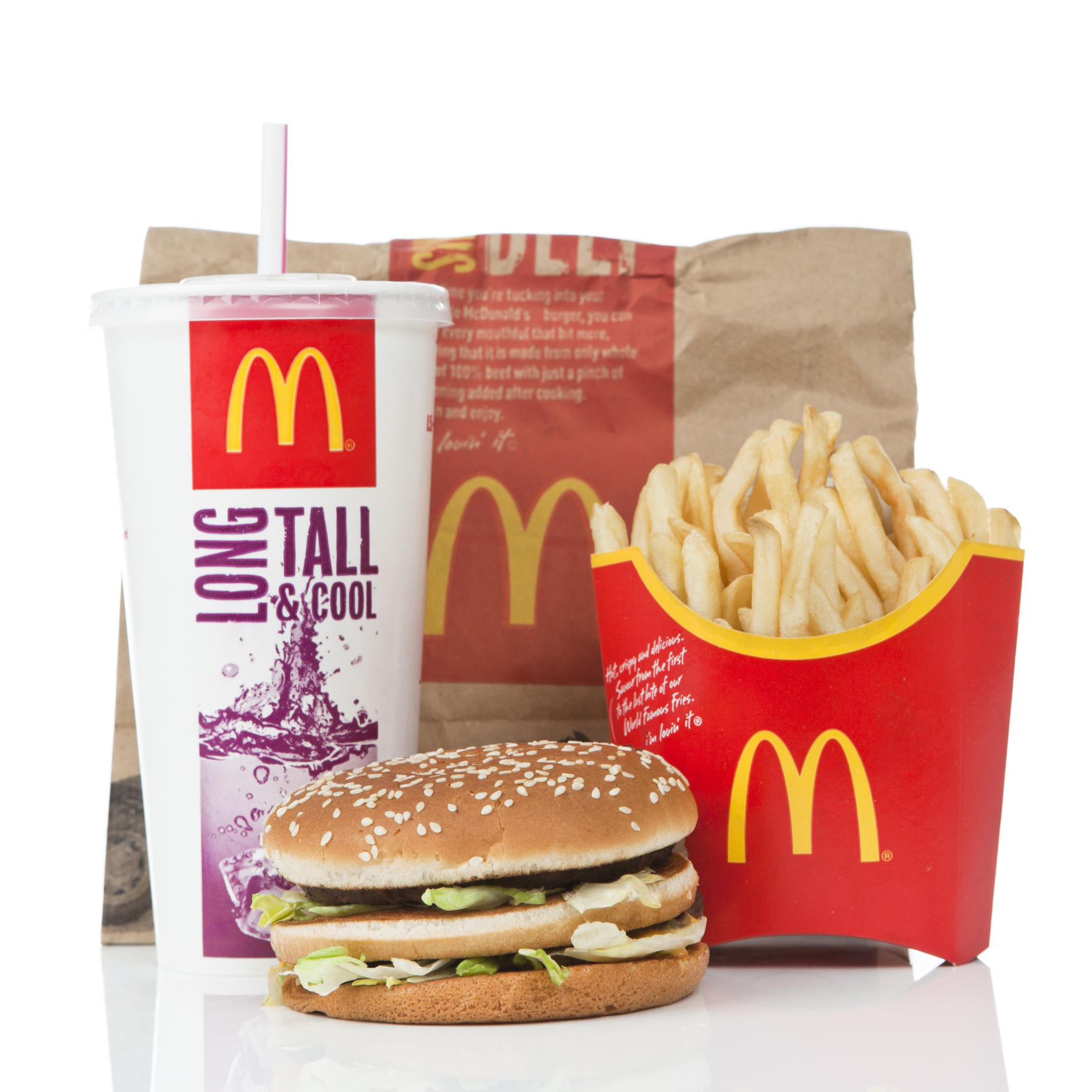 A McDonald's meal with a Big Mac burger, a large fries, and a large soda with a straw