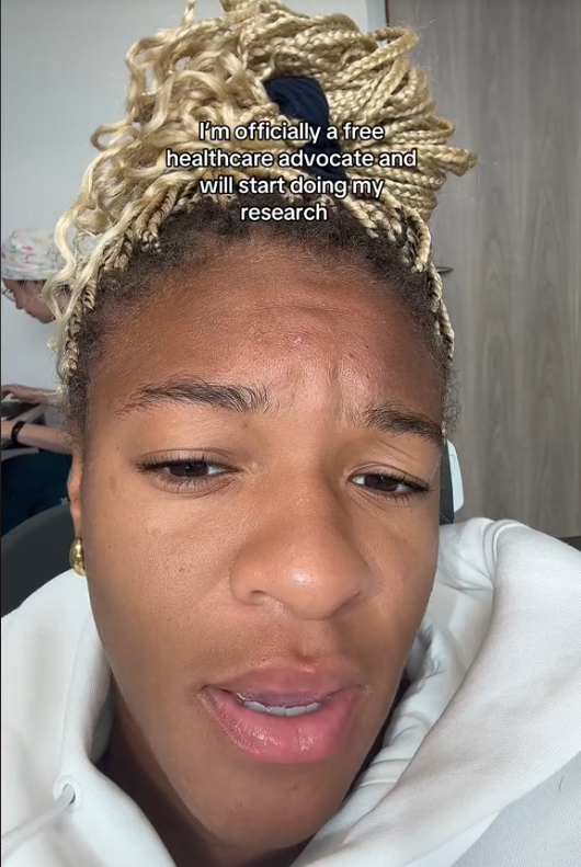 Ariana Ramsey in a white hoodie announces, &quot;I'm officially a free healthcare advocate and will start doing my research.&quot;