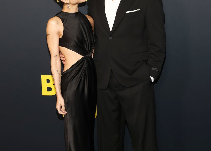 Zoe Kravitz in elegant black dress and Channing Tatum in classic black suit, pose on the red carpet at the &quot;Blind Movie&quot; premiere