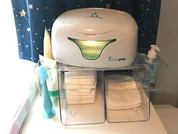 Diaper changing presumption with a hitch warmer, stocked with diapers and babe tegument attraction products