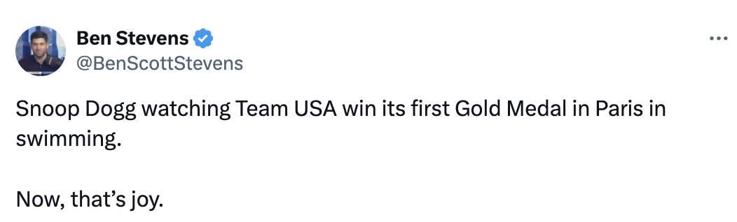 Tweet by Ben Stevens about Snoop Dogg watching Team USA win its first Gold Medal in Paris for swimming, expressing joy