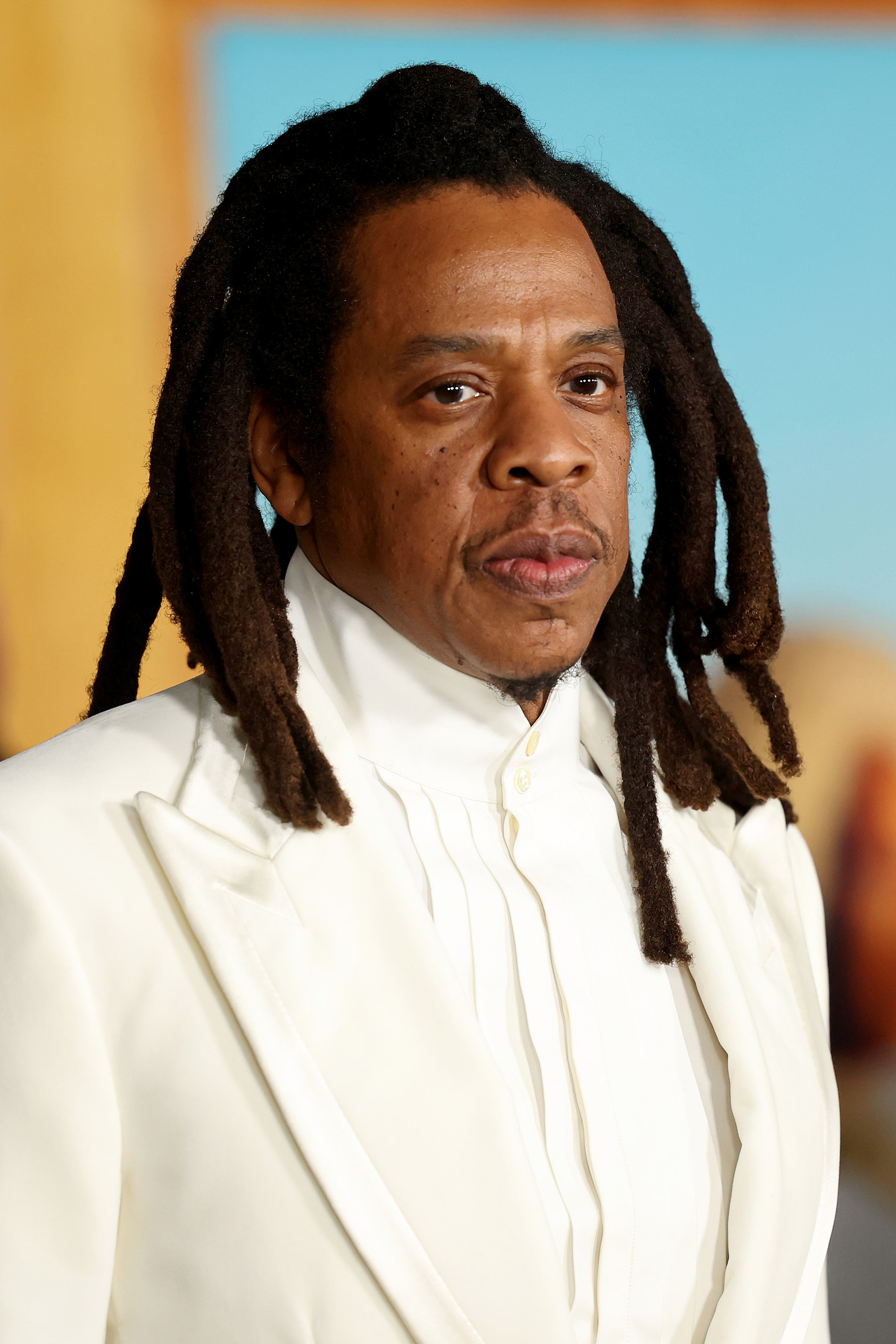 Jay-Z in a formal suit at a celebrity event