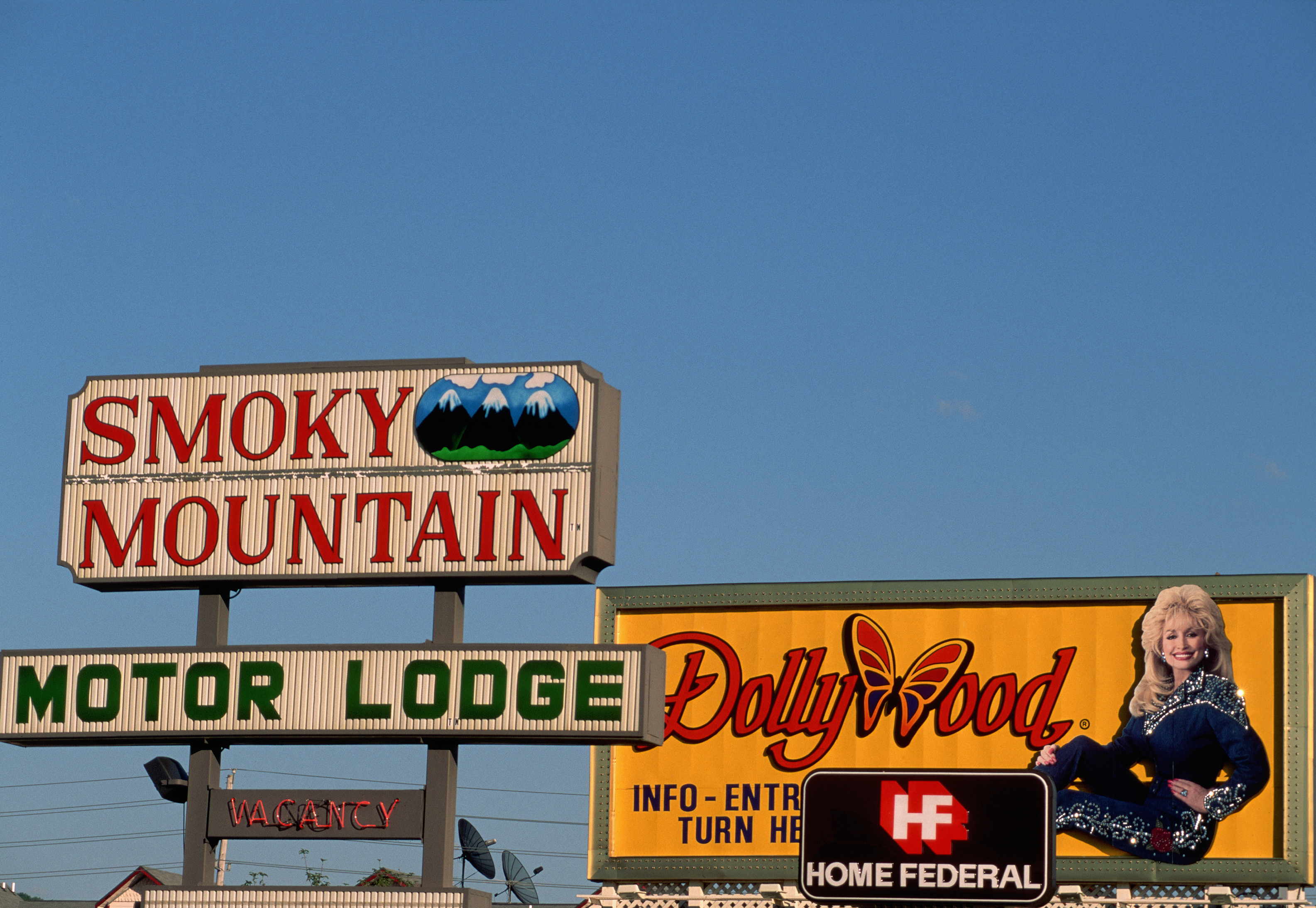 Billboard signs for Smoky Mountain Motor Lodge and Dollywood in Pigeon Forge. Tennessee