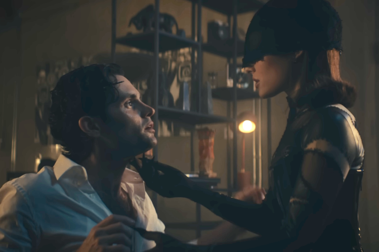 Penn Badgley and Ariana Grande in the The Boy Is Mine music video