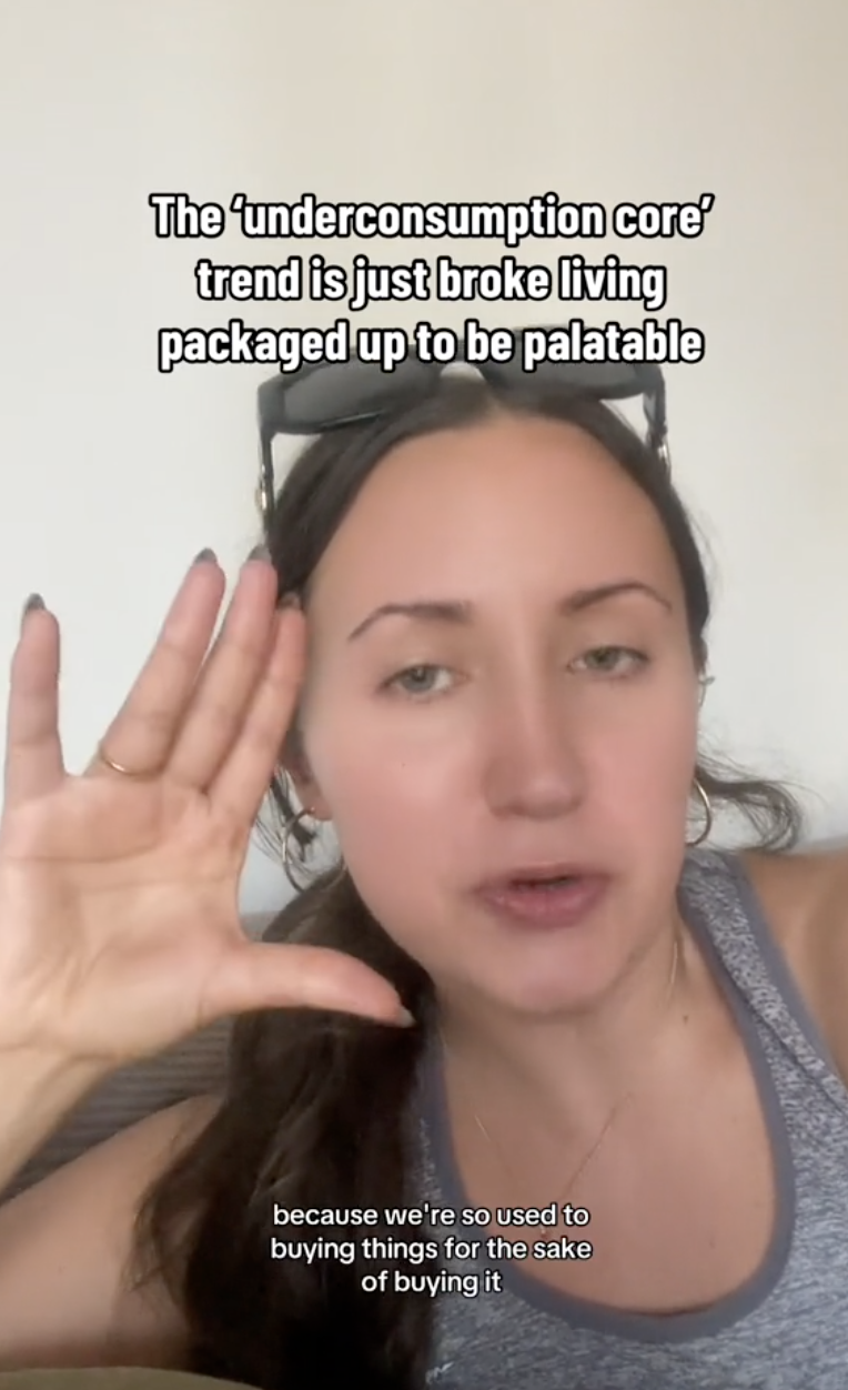 Jess gesturing with hand raised, wearing sunglasses on head. Caption reads: "The 'underconsumption core' trend is just broke living packaged up to be palatable"发