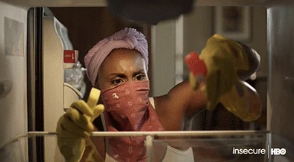 Issa Rae intensely cleans her refrigerator