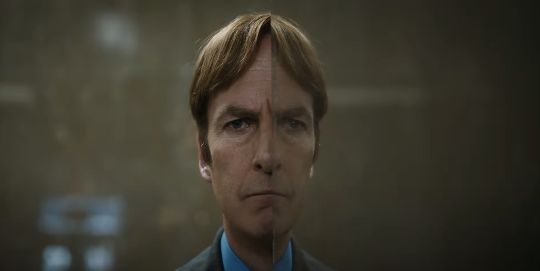 Bob Odenkirk's character, Jimmy McGill, is shown looking serious, facing forward, with half of his face reflected in a split screen effect