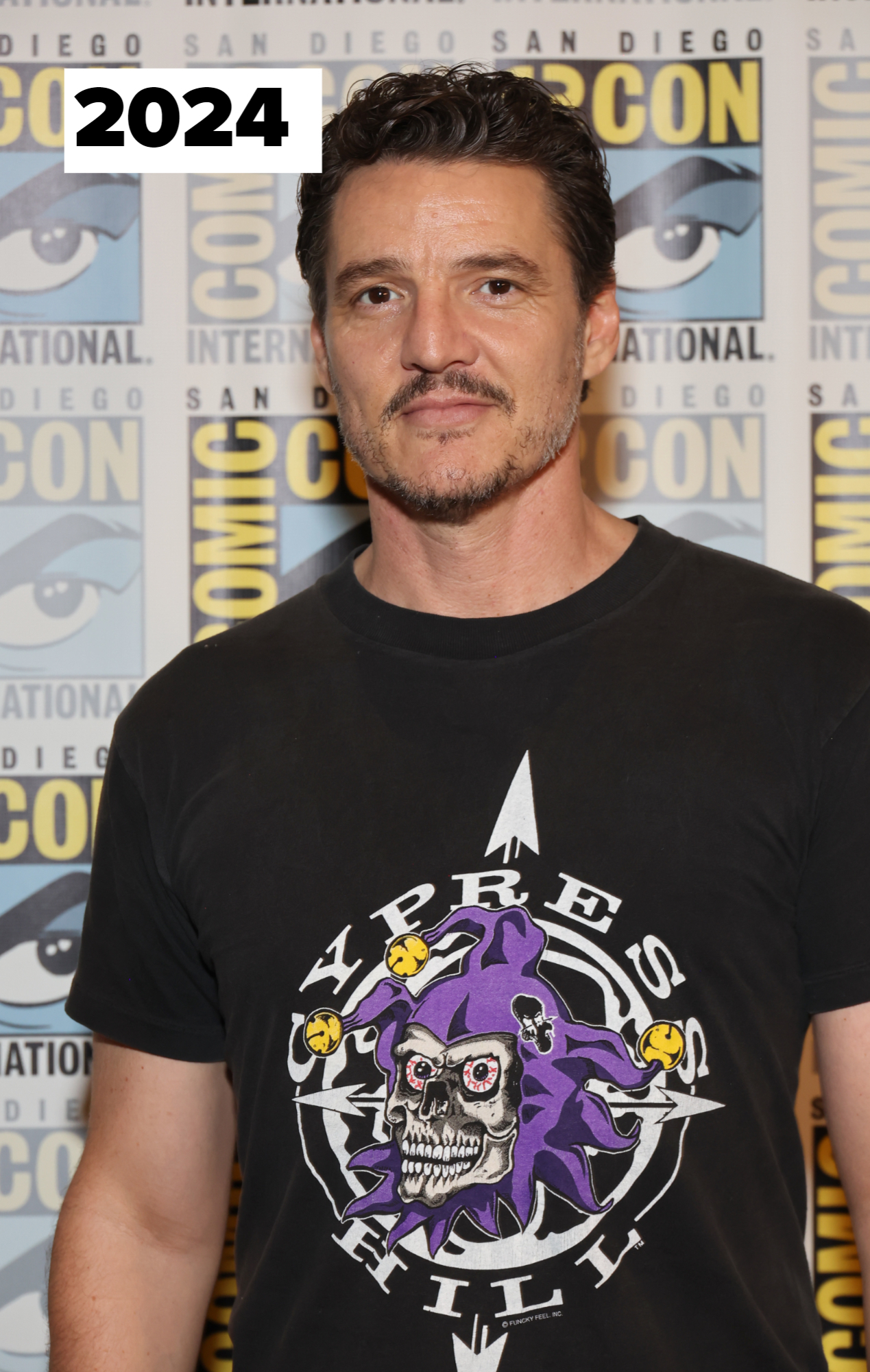 Pedro Pascal at San Diego Comic-Con, wearing a T-shirt with a Cypress Hill graphic