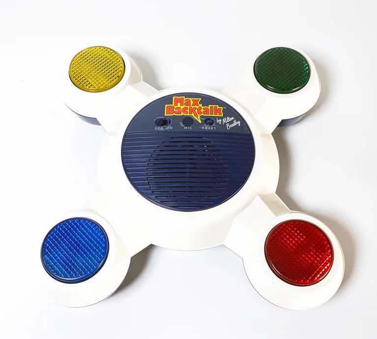Classic "Max Backtalk" interactive electronic game device with large, colored buttons and central speaker