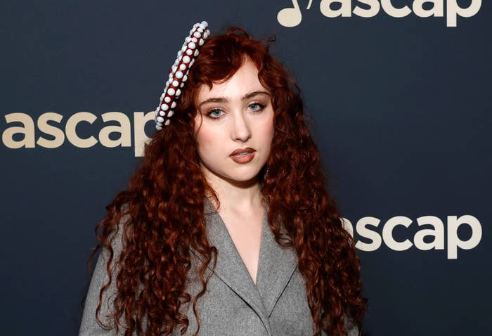 Red carpet photo of Chappell Roan. She is posing in front of an ASCAP backdrop