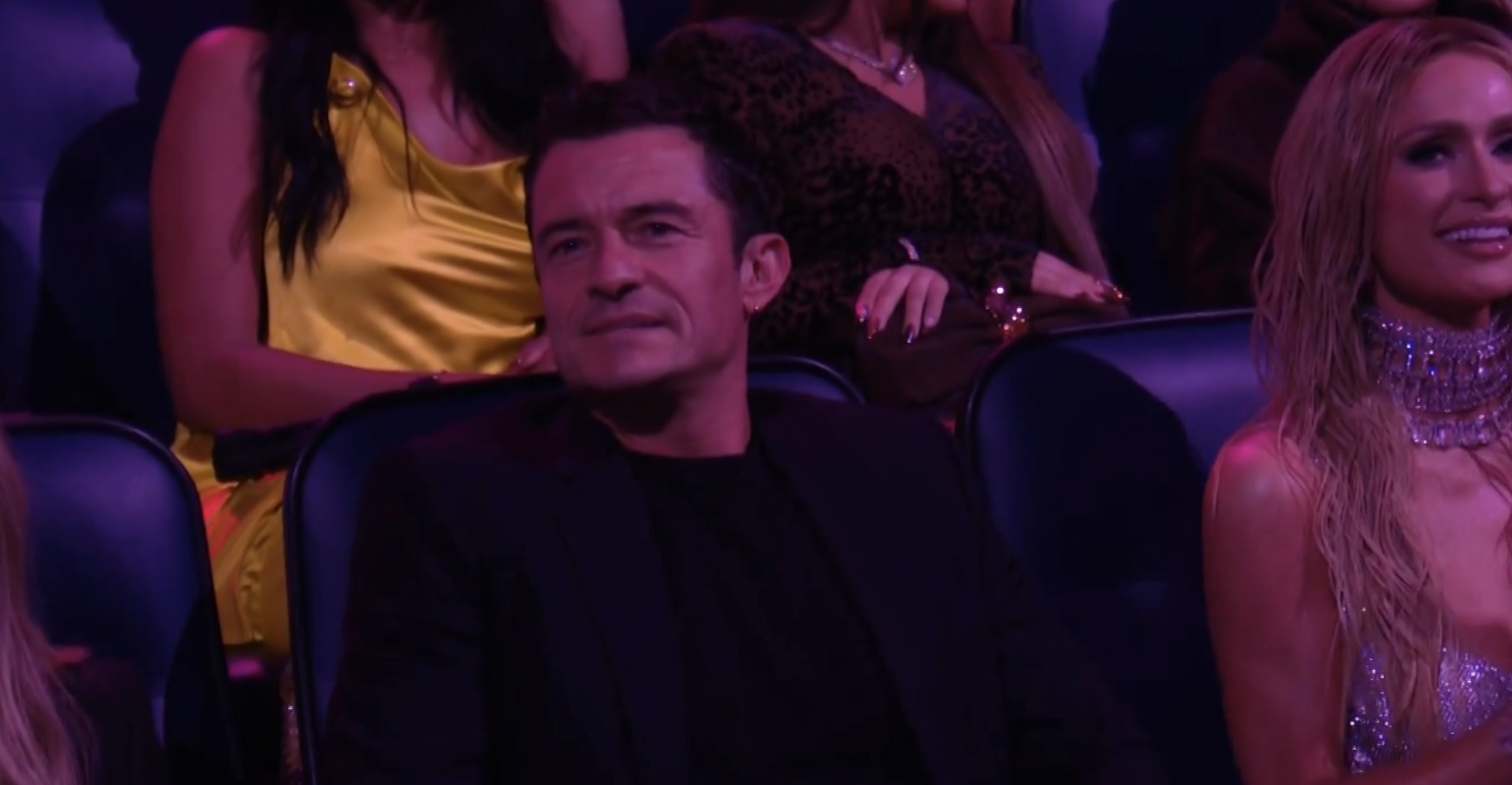 Orlando Bloom watches his fiancée's performance