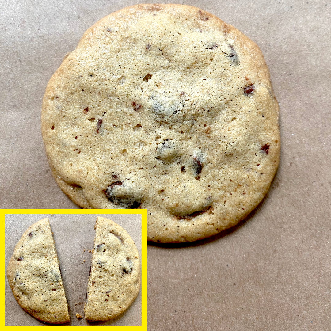 A large chocolate chip cookie is shown. In the bottom left corner, an inset image displays the same cookie cut in half