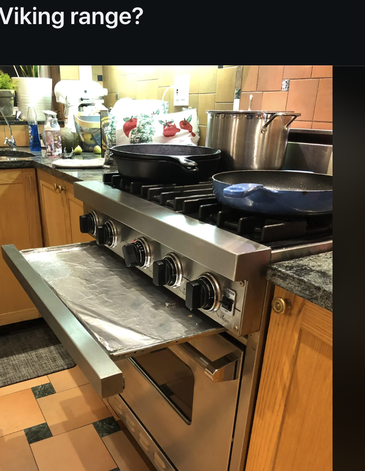 Reddit post by u/whatsthisthing asking "What is this part of a Viking range?" with an attached image of a kitchen stove's warming drawer pulled open