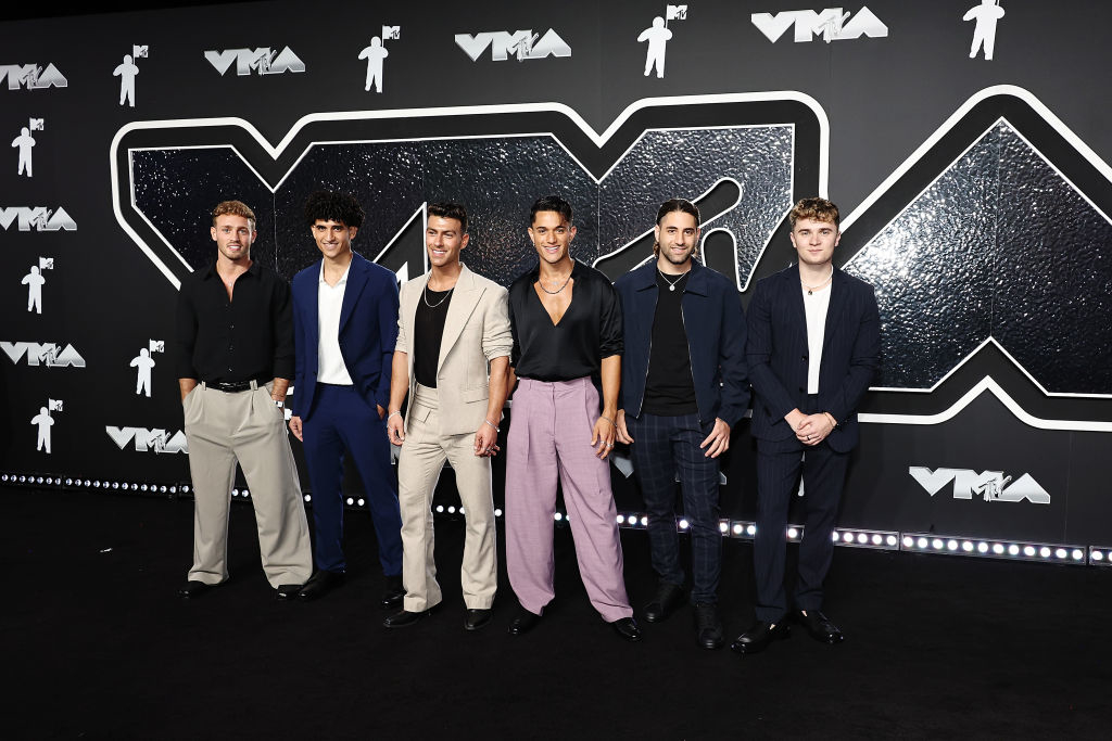AS1ONE posing together