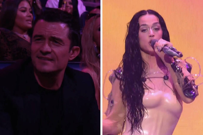 Orlando Bloom watches Katy Perry perform on stage in a futuristic, form-fitting dress
