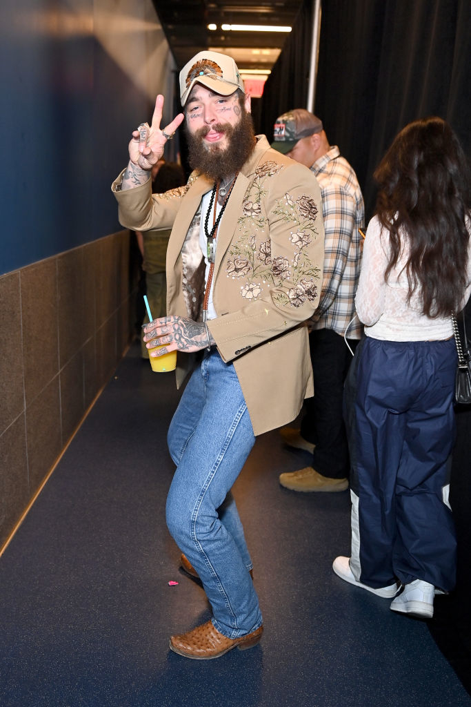 Post Malone poses backstage