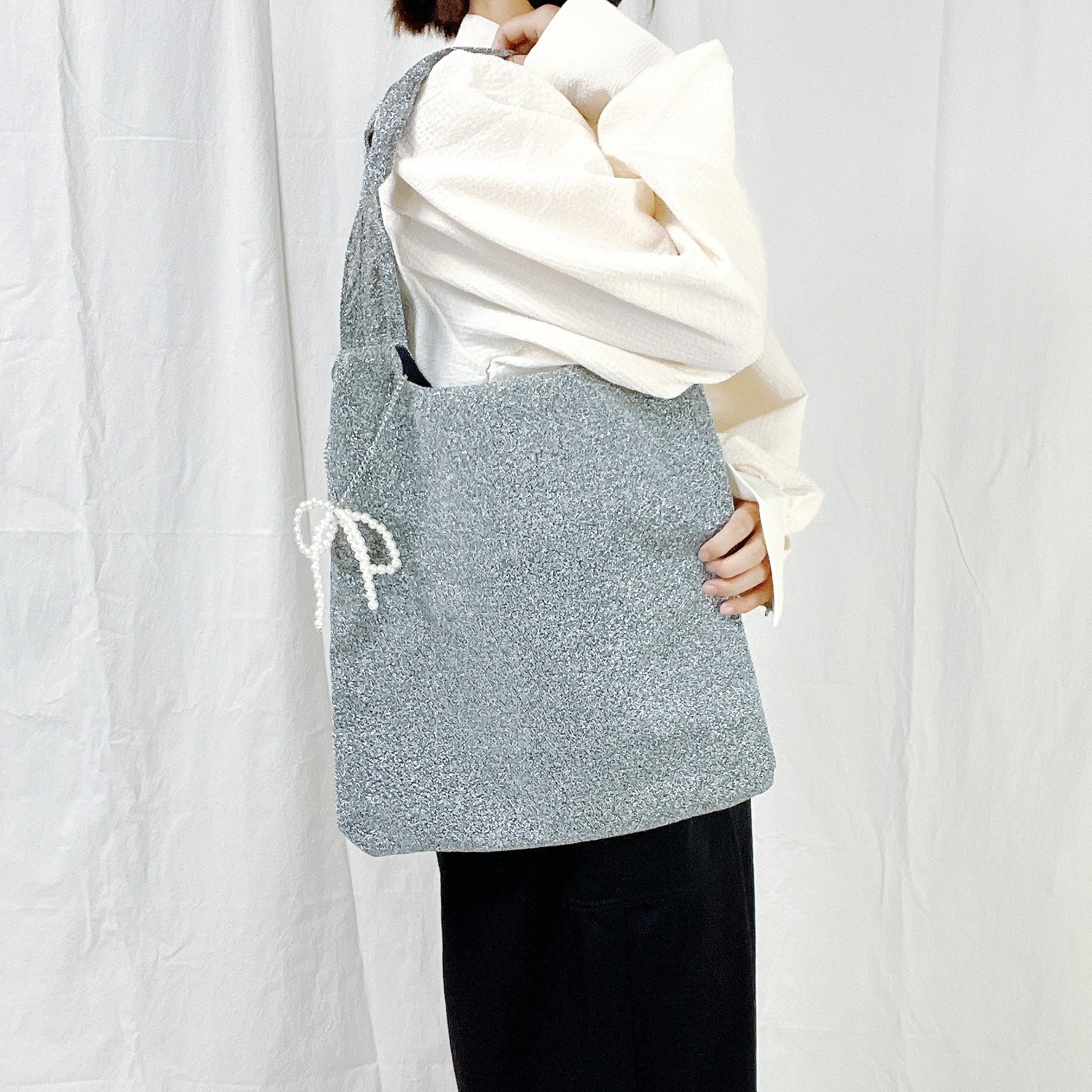 しまむらのおすすめファッションアイテム「リボンチャームツキラメTT」