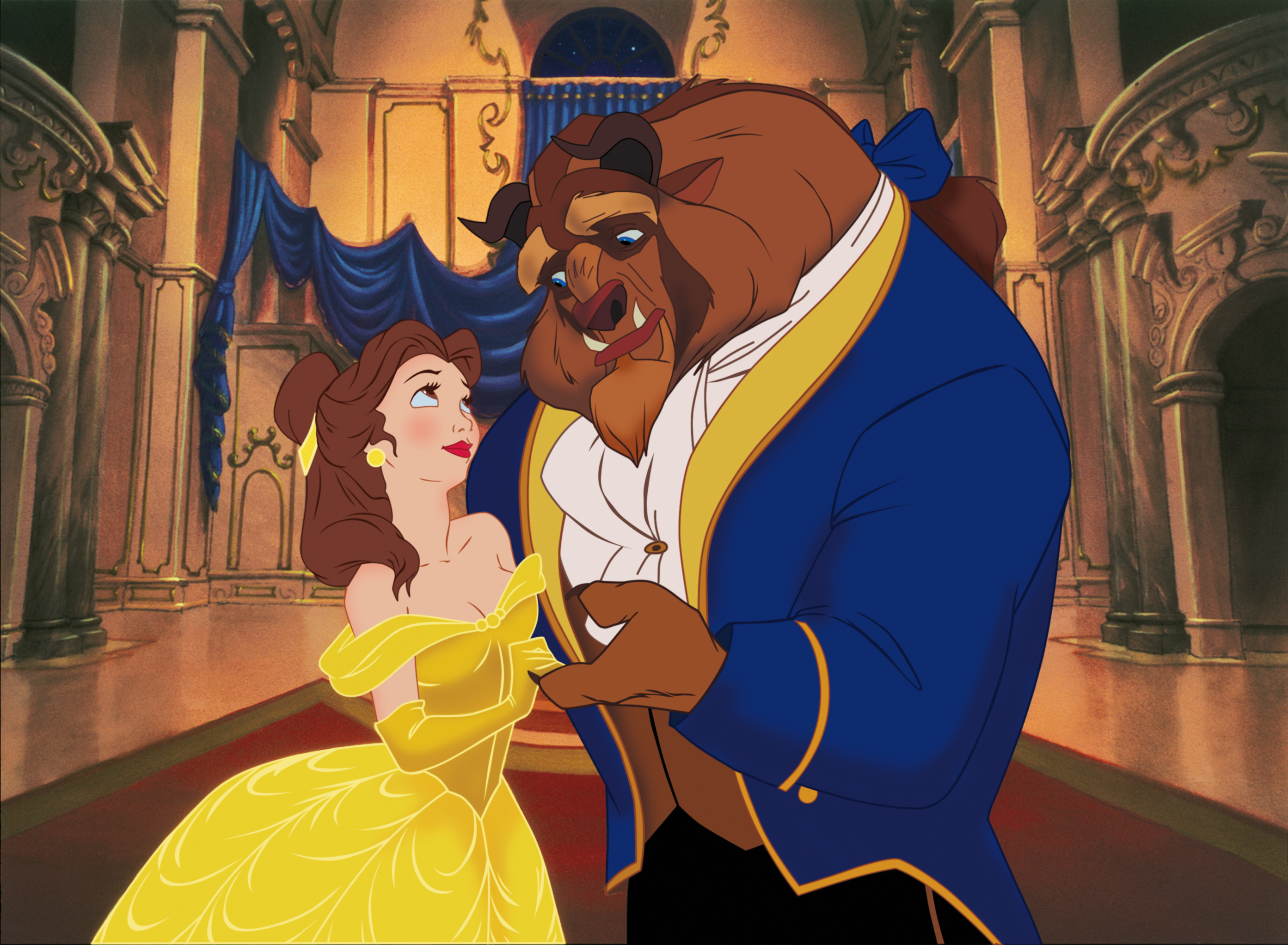 Belle in a yellow gown and Beast in a blue jacket stand together in a grand hall from Disney's Beauty and the Beast