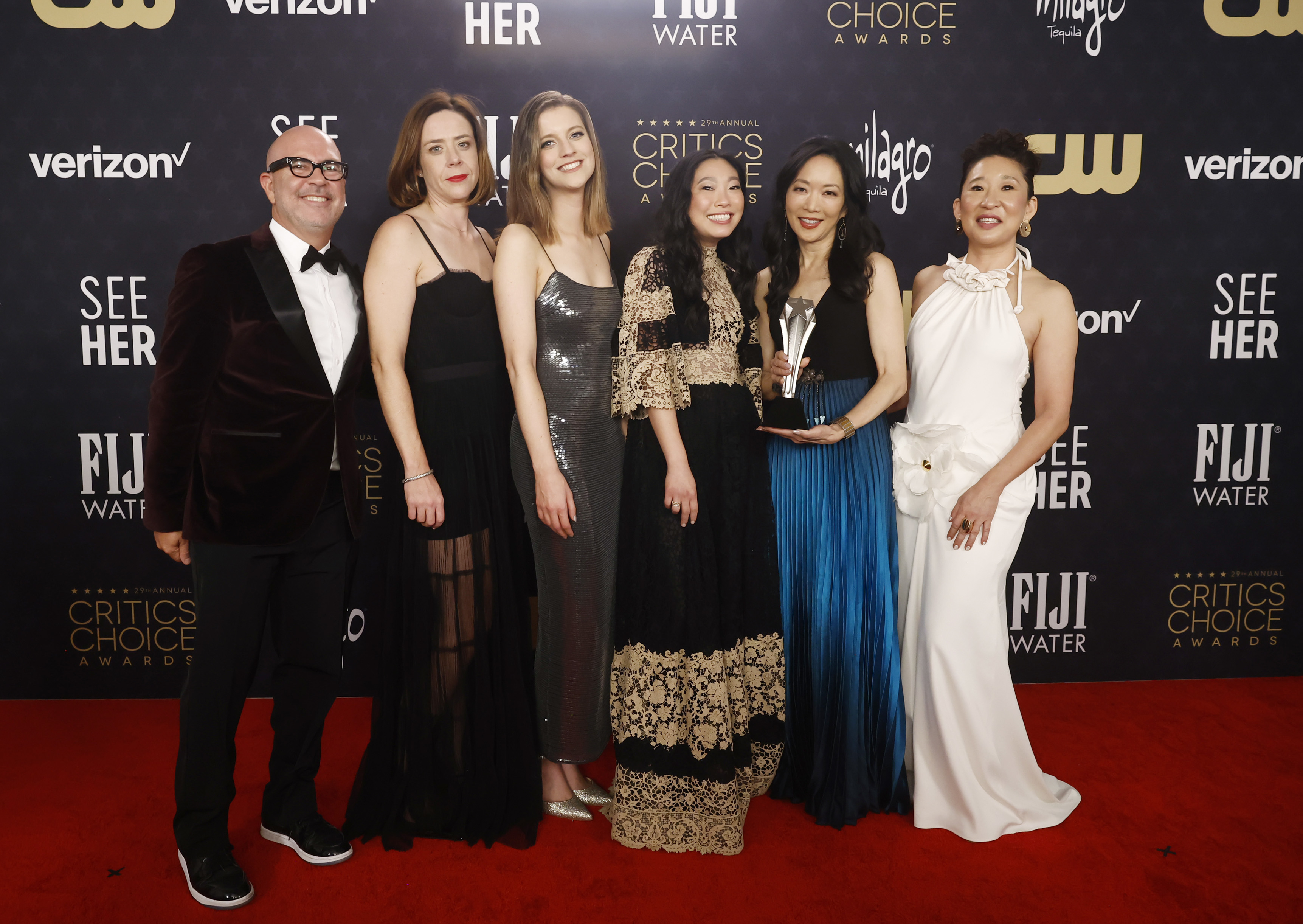Group photo on the red carpet for Quiz Lady at Critics Choice Awards